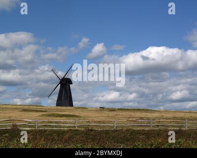 Beacon Mill windmill, standing in a field near the A259 at Rottingdean, East Sussex Stock Photo