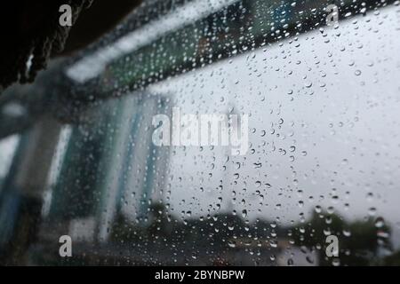 raindrop on glass in malaysia Stock Photo