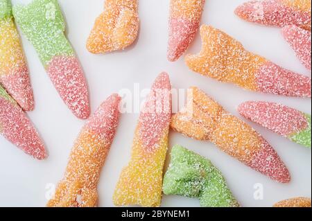 Colorful jelly candy worms background macro close up view Stock Photo