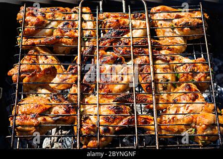 Grilled chicken wings in marinade. Barbeque chicken wings Stock Photo
