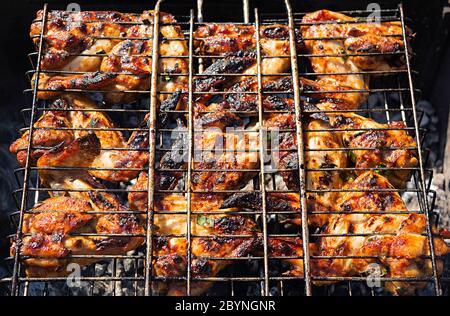 Grilled chicken wings in marinade. Barbeque chicken wings Stock Photo