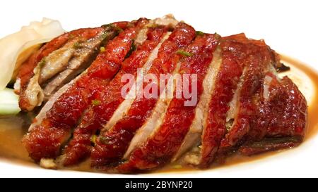 roast duck with pickled ginger in plate isolated on background Stock Photo