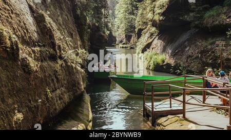 Tourist boat in Hrensko National Park, Bohemian Switzerland, Czech Republic. People waiting queue. Ship transport. Tourist attraction Stock Photo