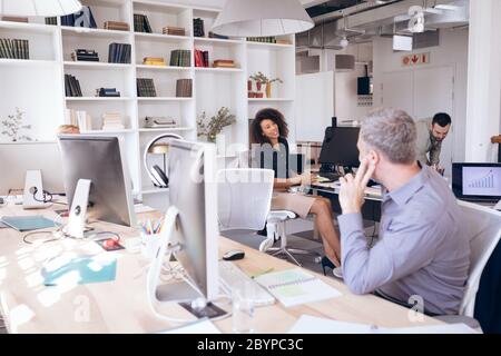 Happy multi races businesspeople working together Stock Photo