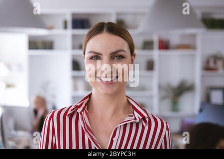 Happy Caucasian businesswoman smiling portrait Stock Photo