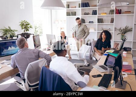 Happy multi races businesspeople working together Stock Photo
