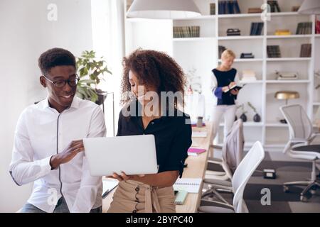 Happy multi races businesspeople working together Stock Photo