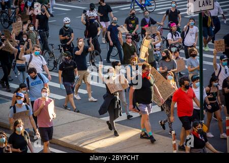 Black Lives Matter demonstrators march up 9th Avenue in Chelsea in New York protesting the death of George Floyd, seen on Saturday, June 6, 2020. (© Richard B. Levine) Stock Photo