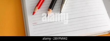 Blank notebook paper, pencil and glasses workplace Stock Photo