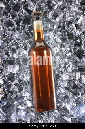 3d illustration of a beer bottle and ice cubes Stock Photo