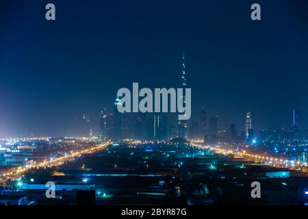 Dubai panorama and Burj Khalifa is currently the tallest building in the world, at 829.84 m (2,723 ft). Stock Photo