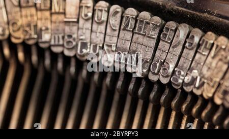 Close-up of an old retro typewriter with paper Stock Photo