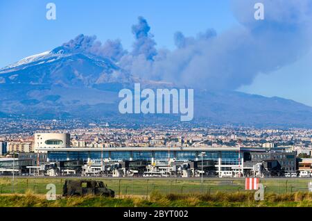 Airport of Catania in front of a live eruption of Mount Etna (Sicily, Italy) on the 24th December 2018 Stock Photo