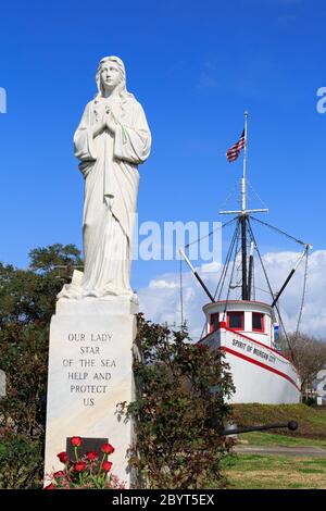 Shrimp boat & statue, Historic District, Morgan City, Louisiana, USA Stock Photo