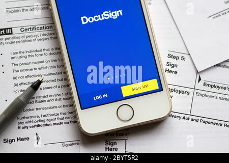 DocuSign mobile app login page is seen on a smartphone. Stock Photo