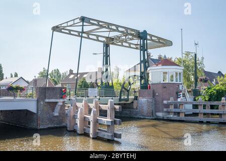 Bridge over river 'Old Rhine' (dutch: Oude Rijn) in the village of Koudekerk aan den Rijn, Netherlands Stock Photo