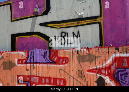 Black lives matter graffiti on brick wall Stock Photo - Alamy