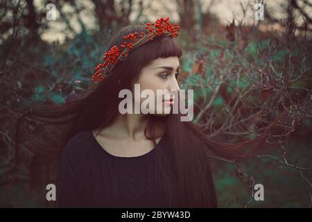 Winter portrait of young woman with long hair . Seasonal and romantic Stock Photo