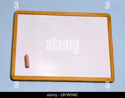 Empty Whiteboard and Chalk Stock Photo