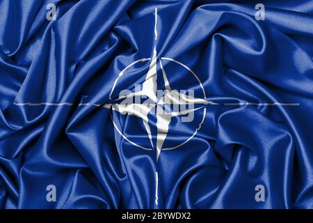 Satin flag with emblem Stock Photo