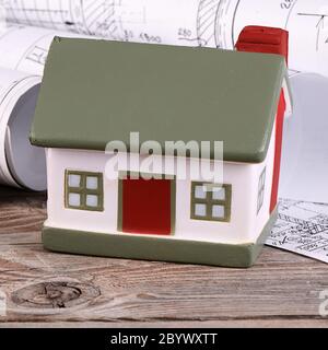 Projects of houses with model of a house Stock Photo