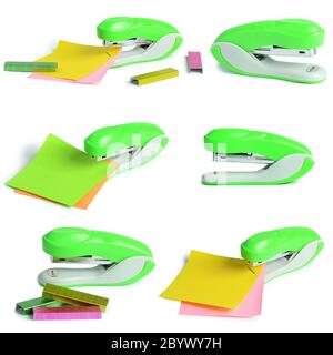 Green stapler isolated on white background Stock Photo