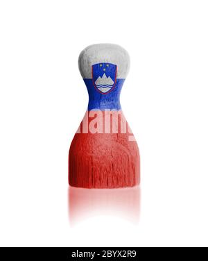 Wooden pawn with a flag painting Stock Photo