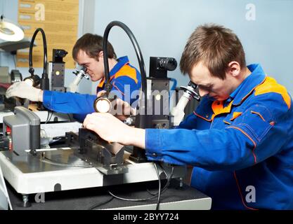two workers at tool workshop Stock Photo