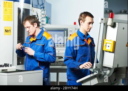 two workers at tool workshop Stock Photo