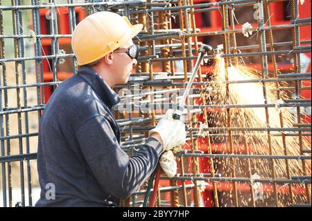 construction worker with flame cutting equipment Stock Photo