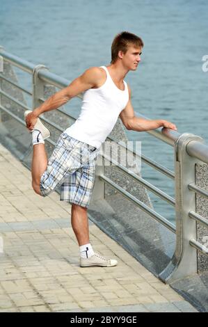 Stretching exercises before sport jogging Stock Photo