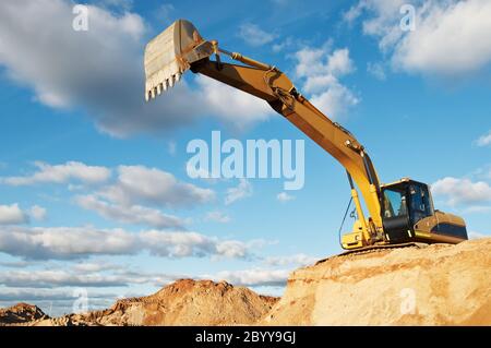 track-type loader excavator at construction area Stock Photo