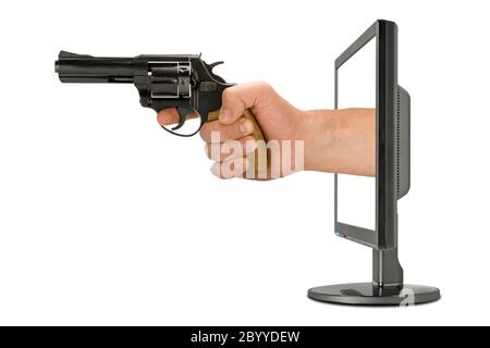 Computer monitor and hand with gun Stock Photo