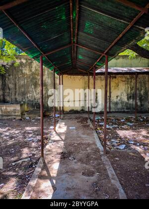 unused old walking shed with full of used plastics. Stock Photo