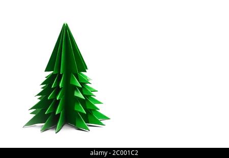 Green origami christmas tree isolated on white background Stock Photo ...