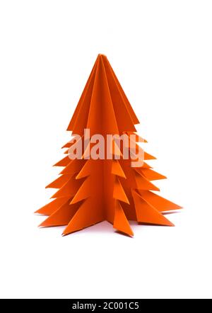 Orange origami christmas tree isolated on white background Stock Photo