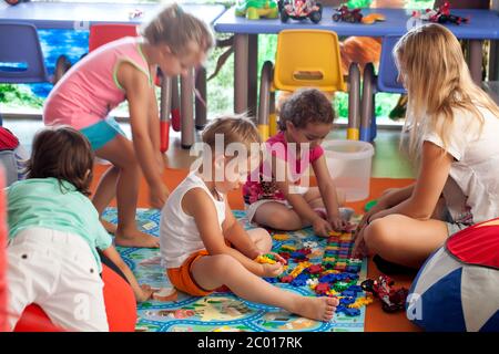 Children playing games in nursery Stock Photo