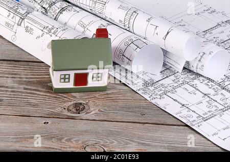 Projects of houses with model of a house Stock Photo