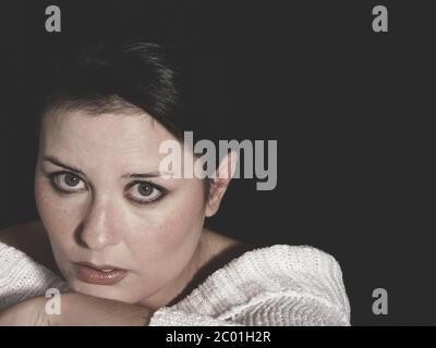 vulnerable woman concept of psychological abuse, beautiful young brunette Stock Photo