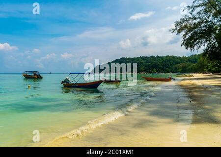 Teluk Dalam Beach, Besar, Perhentian Islands, Malaysia; May-2019; The boat and the sea Stock Photo