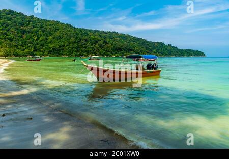 Teluk Dalam Beach, Besar, Perhentian Islands, Malaysia; May-2019; The boat and the sea Stock Photo