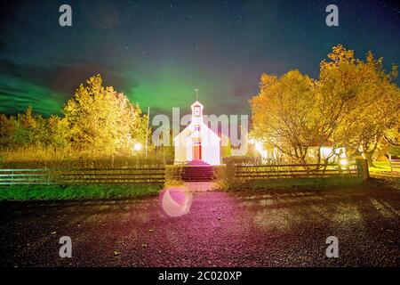 Beautiful landscape with Aurora borealis taken in Iceland on a clear sky night, dancing northern lights Stock Photo