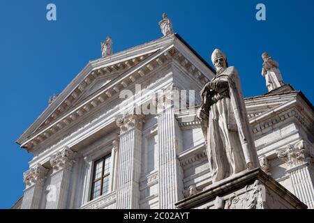 Urbino (Italy) Cathedral façade with statue on the front Stock Photo