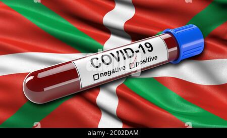 Flag of the Basque Autonomous Community waving in the wind with a positive Covid-19 blood test tube. Stock Photo