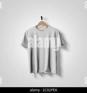 White t-shirt mock up hanging against a plain background 3D Rendering Stock Photo