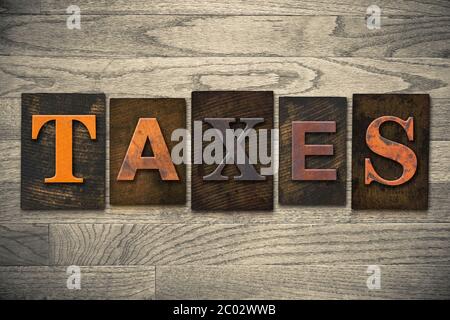 Taxes Concept Wooden Letterpress Type Stock Photo