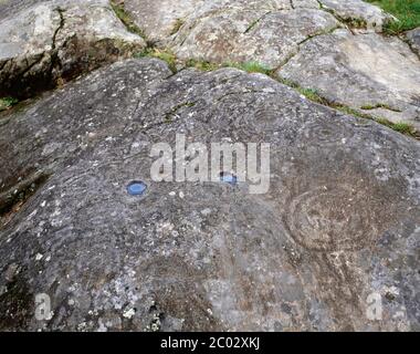 Petroglyphs of Mogor carving on the rock. 'Labyrinth of Mogor', one of the three petroglyphs that remain visible in Mogor. Metal Ages. c. 3.000-2000 BC. Municipality of Marin, Pontevedra province. Galicia, Spain. Stock Photo