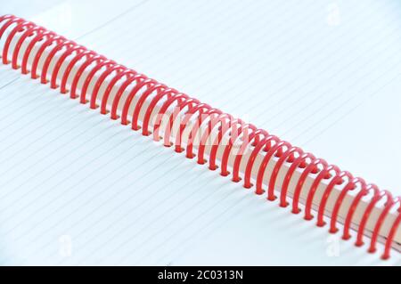 Close up of two blank pages of a diary with red plastic ring Stock Photo