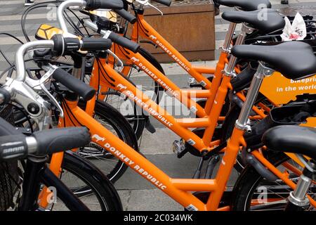 Donkey Republic Bicycles At A Street Rental Station For Rent With An App Bike Sharing Service In Aarhus Denmark Tourist And Public Bike Rental Stock Photo