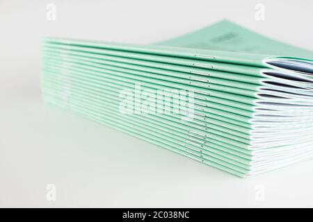 stack of thin student notebooks for elementary school Stock Photo